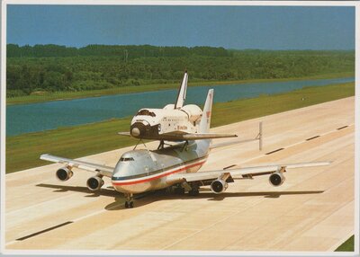 ORBITER COLUMBIA ridding piggyback atop a modified 747 Jet