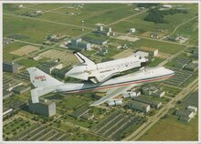 SPACE SHUTTLE rides piggyback on a NASA 474 jet