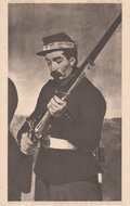 MILITAIR - Manet Soldier examining his rifle